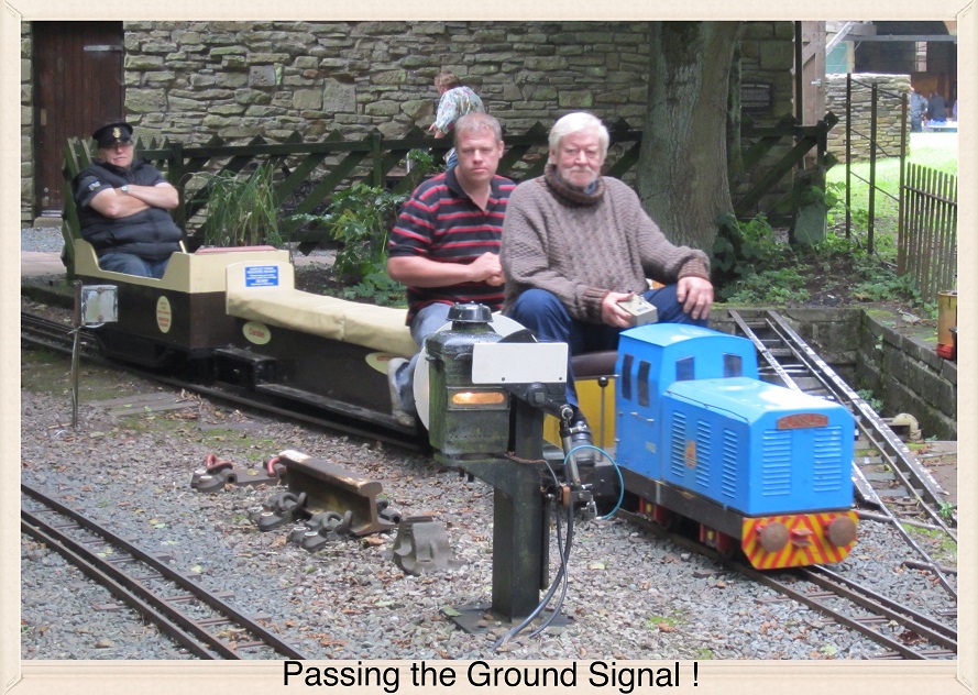 Passengers Wait for the Next Train